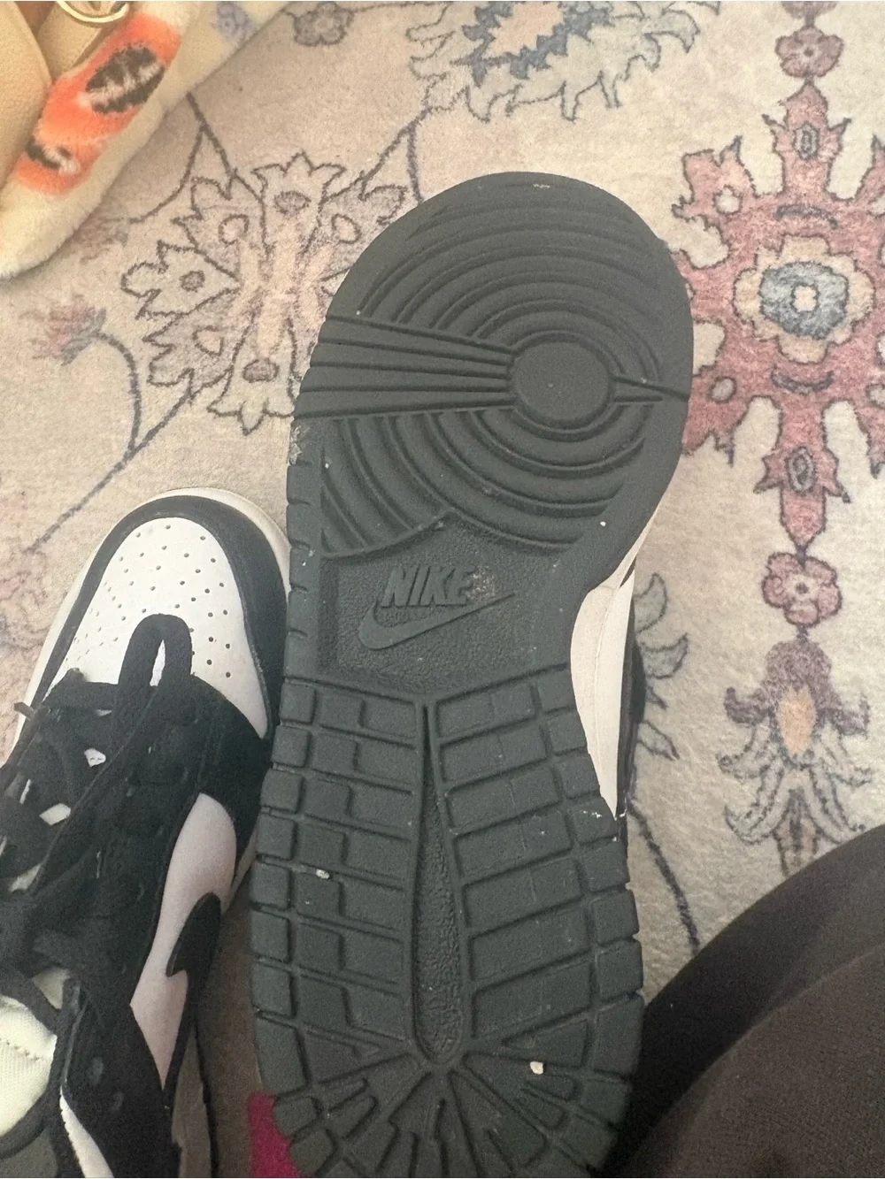 Nike women’s Black and White Low-Top Sneakers